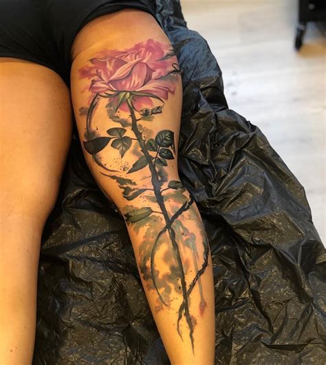 rose tattoo on thigh|rose leg tattoos for females.